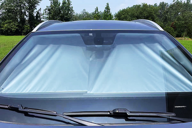 ParcShade extended across a vehicle windshield